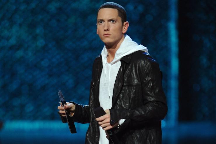 Eminem receiving an award at an MTV award show. It all still seems rather new to him.